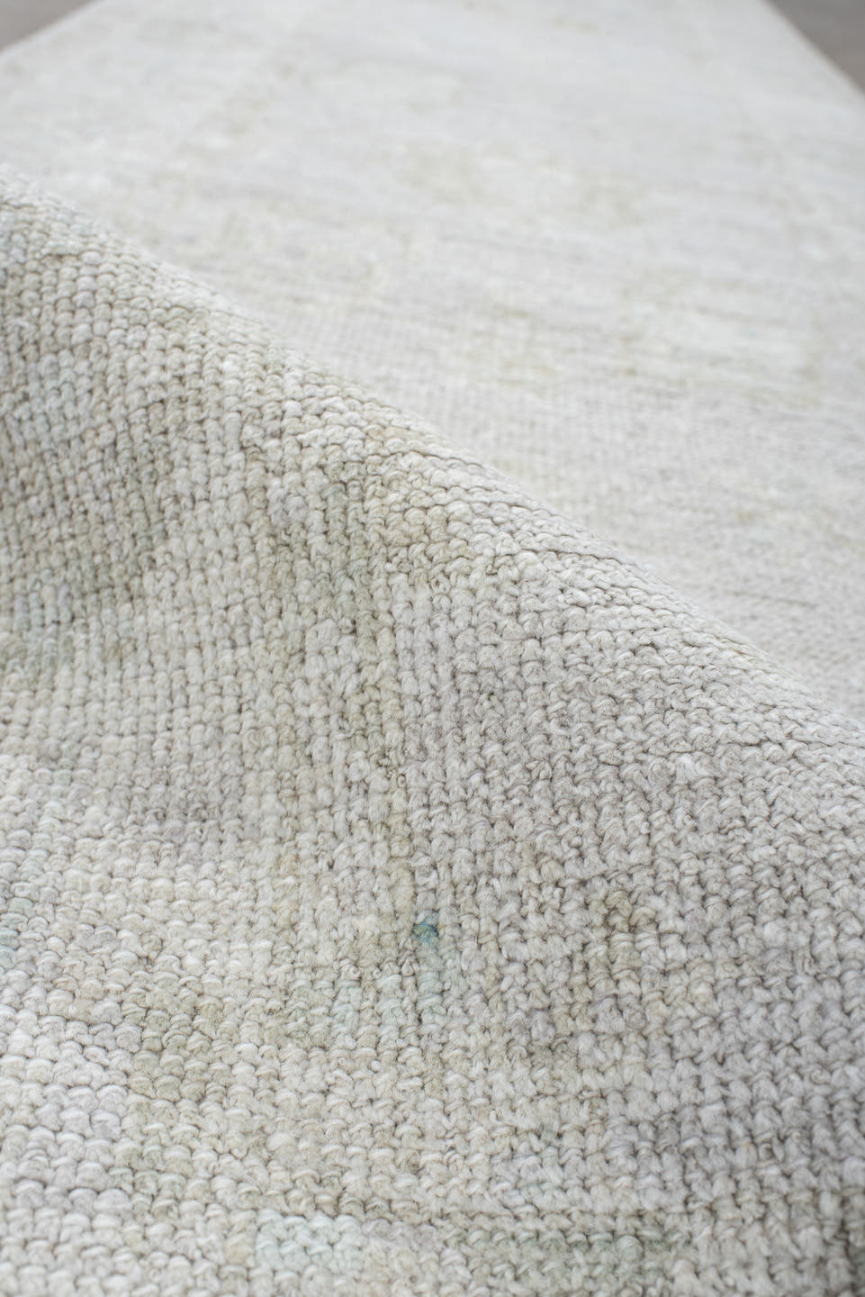 2' x 9' one-of-a-kind handmade antique Oushak runner rug. Color palette: ivory, cream, taupe, beige, pale sage, gray, green