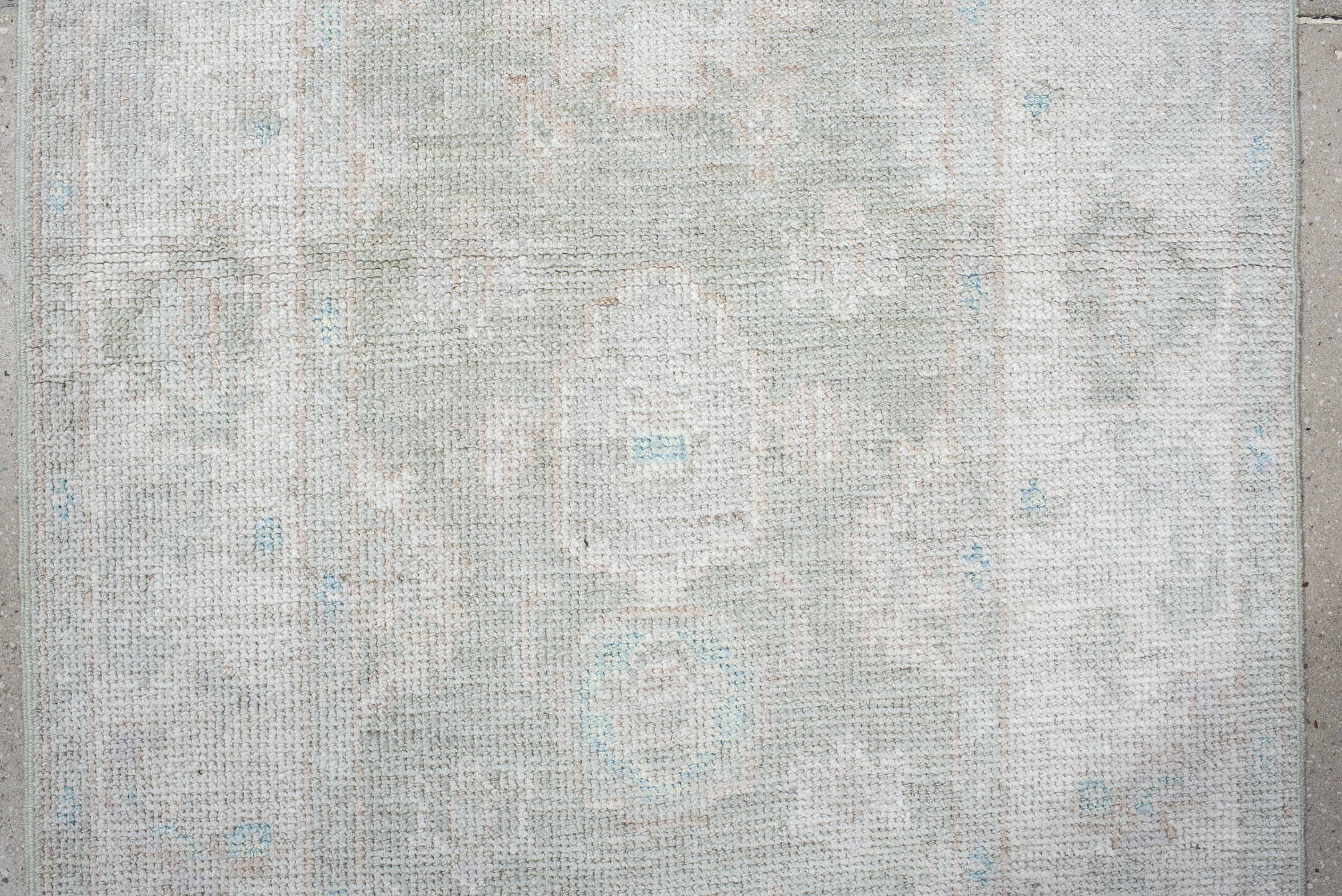 2' x 10' one-of-a-kind handmade vintage Oushak runner rug. Color palette: ivory, pale blue, cream, light gray, light blue
