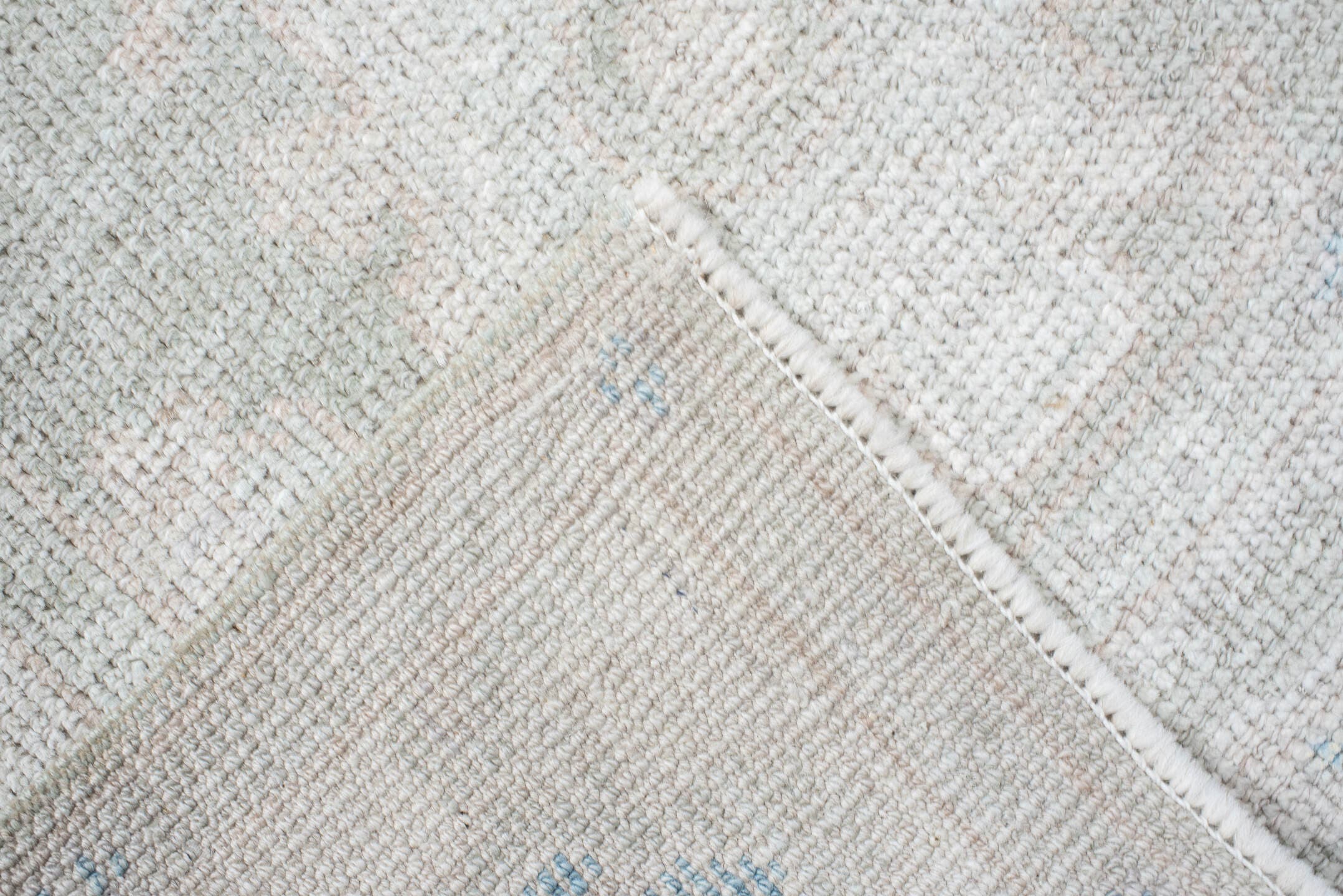 2' x 10' one-of-a-kind handmade vintage Oushak runner rug. Color palette: ivory, pale blue, cream, light gray, light blue