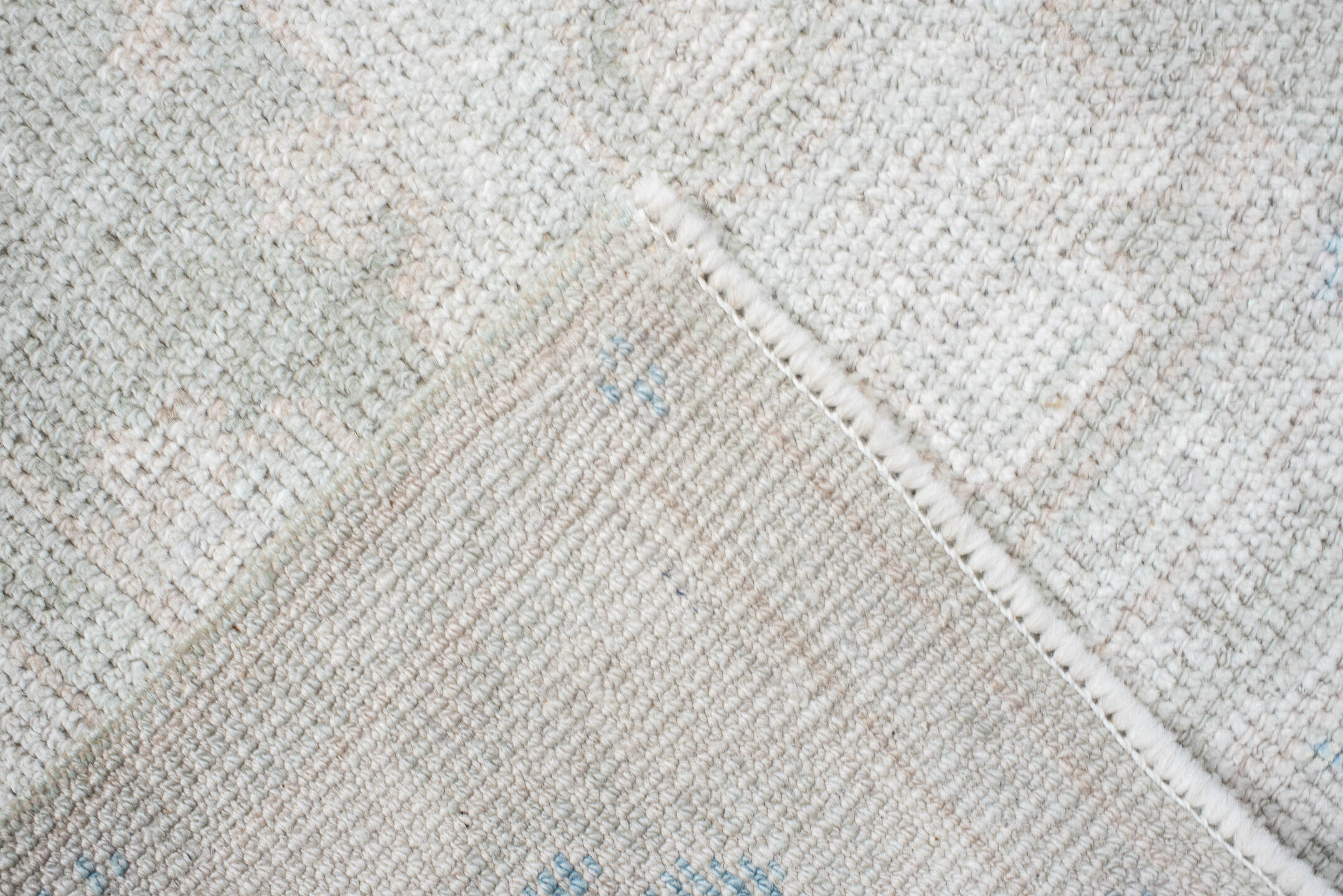 2' x 10' one-of-a-kind handmade vintage Oushak runner rug. Color palette: ivory, pale blue, cream, light gray, light blue