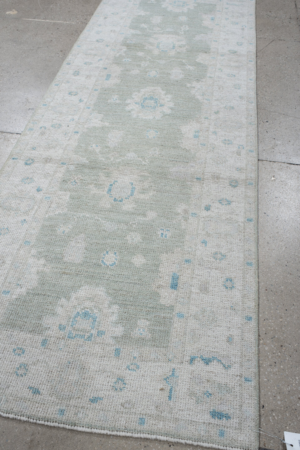 2' x 8' one-of-a-kind handmade vintage Oushak runner rug. Color palette: ivory, pale aqua, cream, light gray, teal
