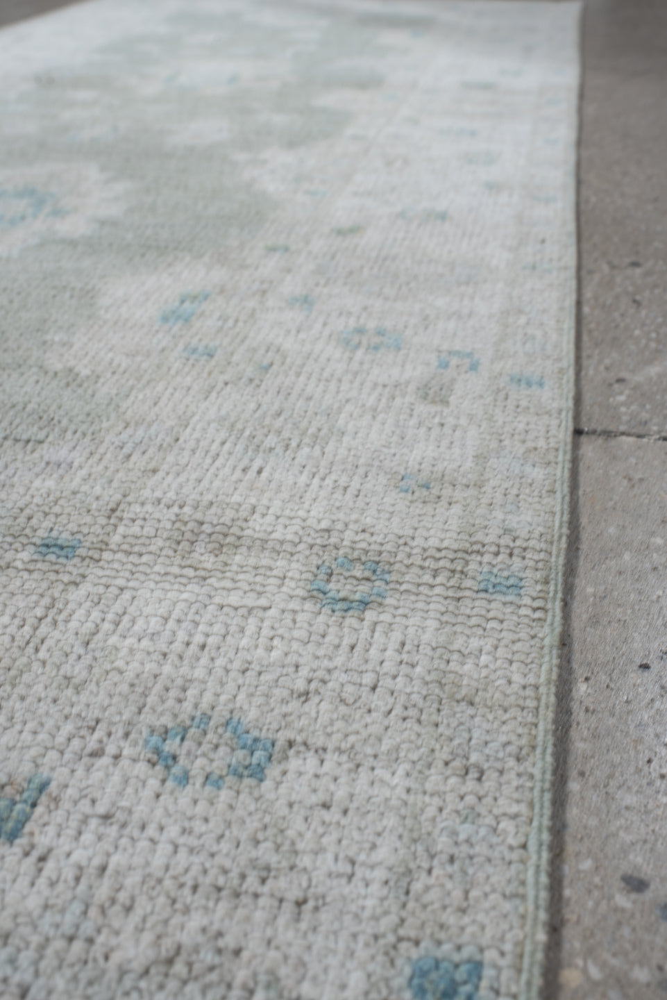 2' x 8' one-of-a-kind handmade vintage Oushak runner rug. Color palette: ivory, pale aqua, cream, light gray, teal