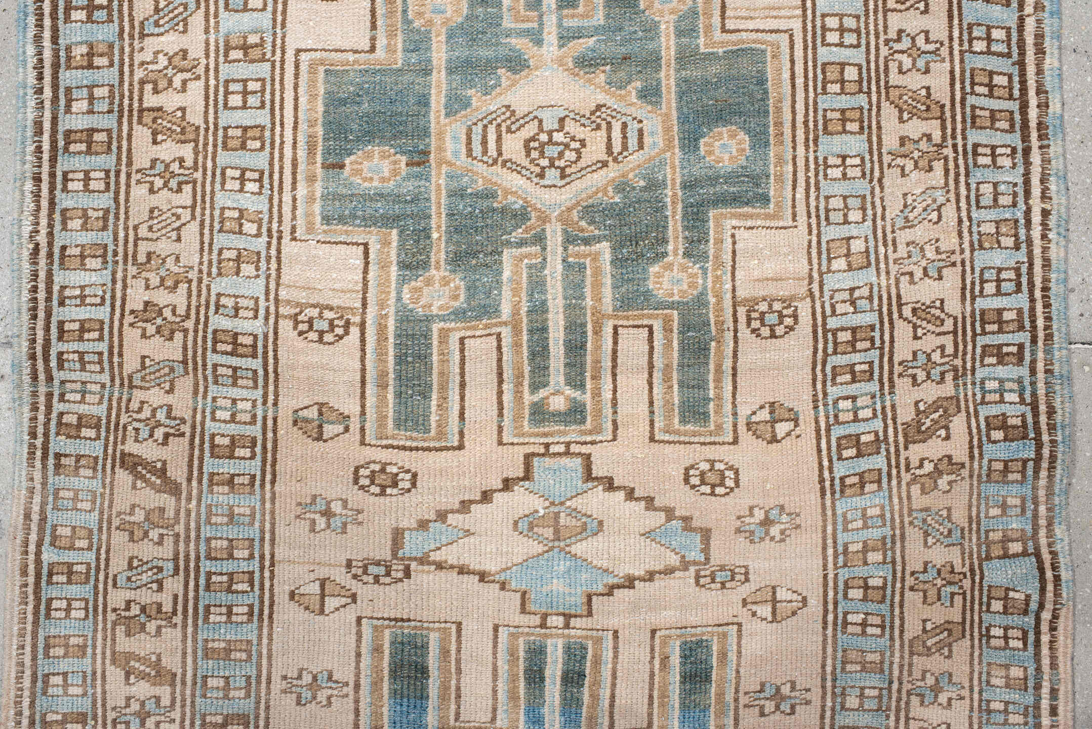 3' x 10' one-of-a-kind handmade antique Karaje runner rug. Color palette: ivory, sky blue, camel, taupe, brown, light blue