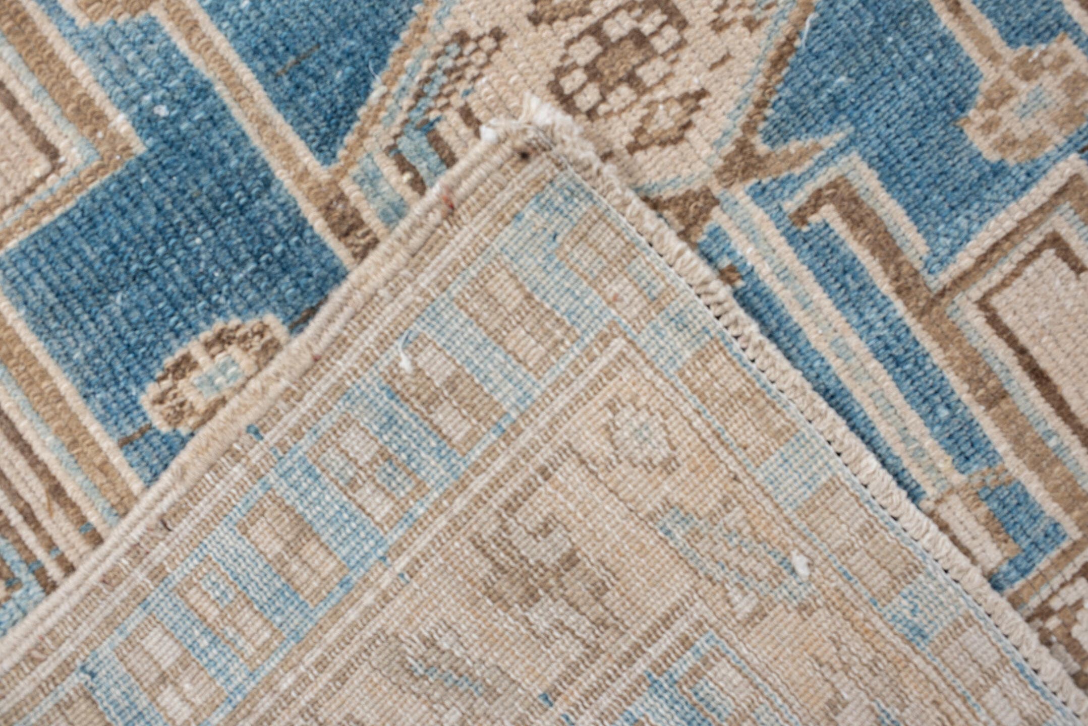 3' x 10' one-of-a-kind handmade antique Karaje runner rug. Color palette: ivory, sky blue, camel, taupe, brown, light blue
