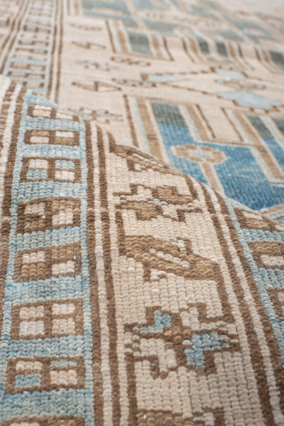 3' x 10' one-of-a-kind handmade antique Karaje runner rug. Color palette: ivory, sky blue, camel, taupe, brown, light blue