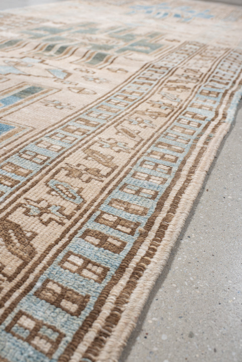 3' x 10' one-of-a-kind handmade antique Karaje runner rug. Color palette: ivory, sky blue, camel, taupe, brown, light blue