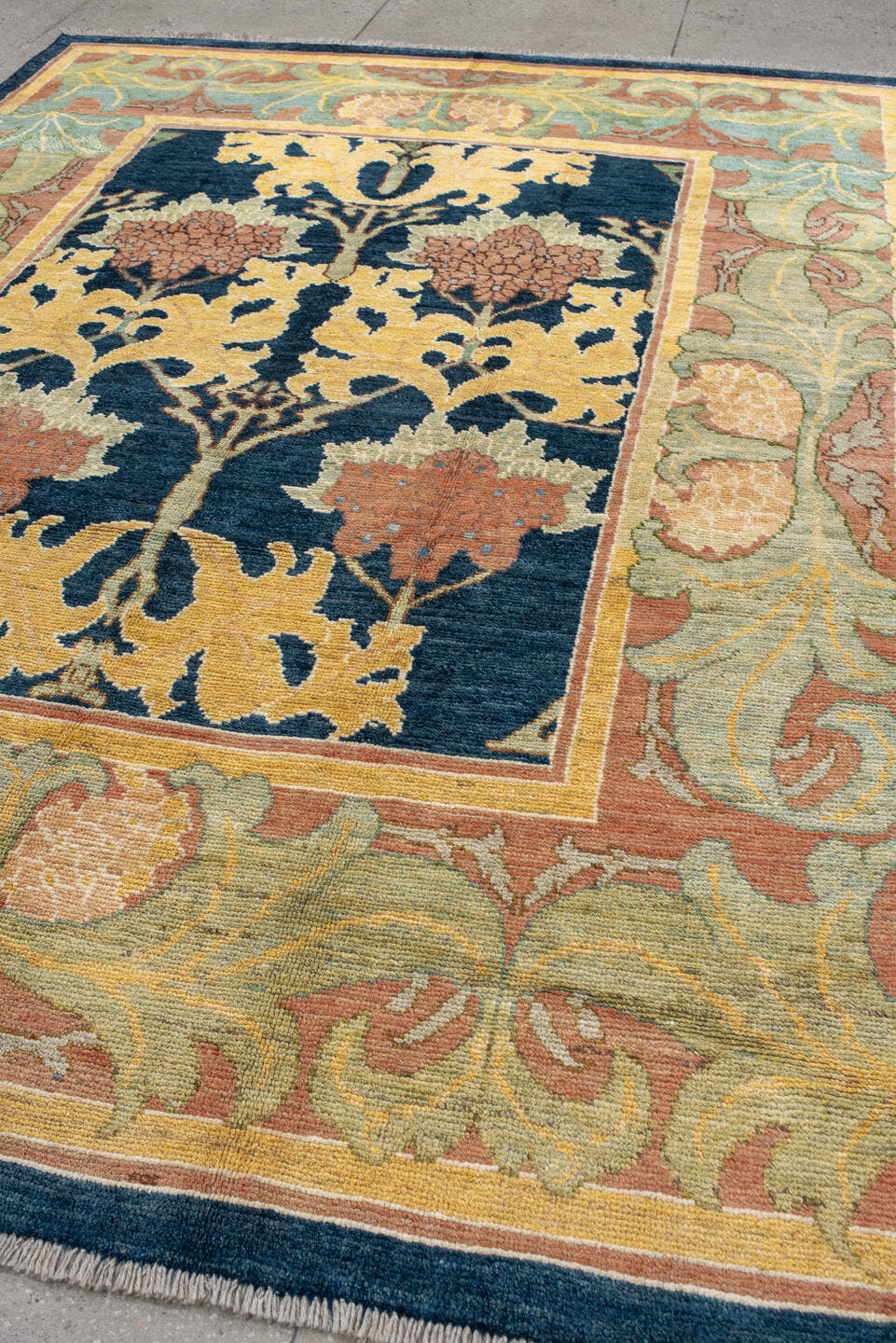 8' x 11' one-of-a-kind handmade vintage Arts & Crafts large size rug. Color palette: navy, sage, gold, terra cotta, ivory