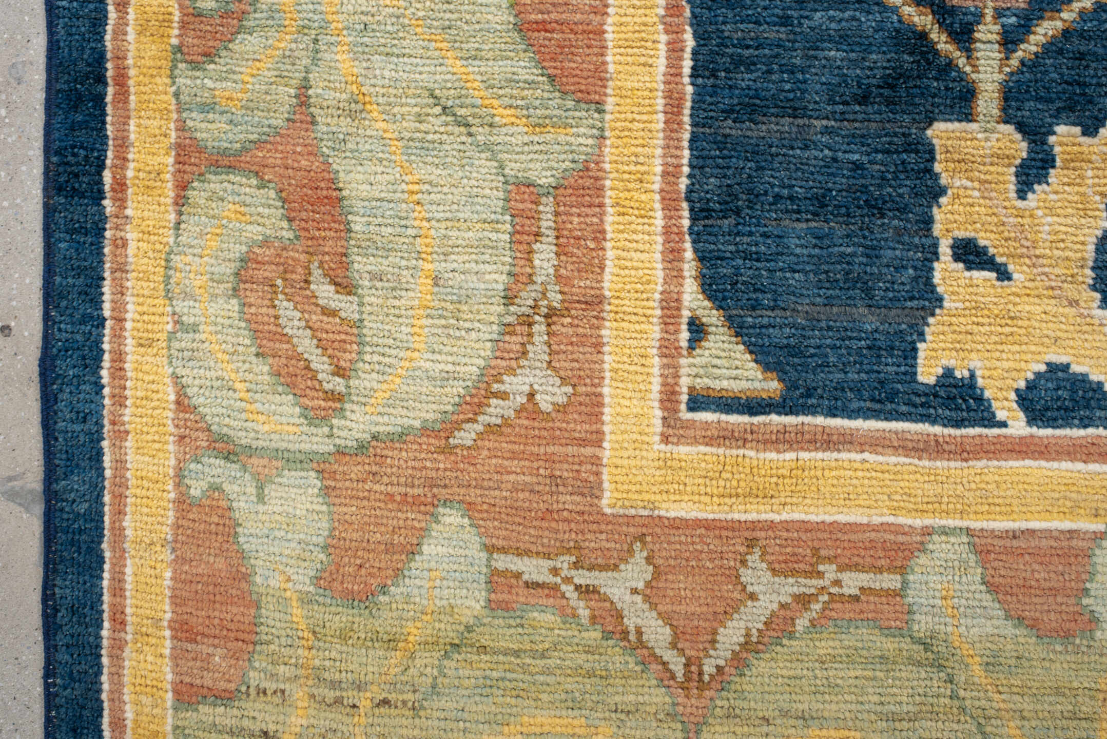 8' x 11' one-of-a-kind handmade vintage Arts & Crafts large size rug. Color palette: navy, sage, gold, terra cotta, ivory