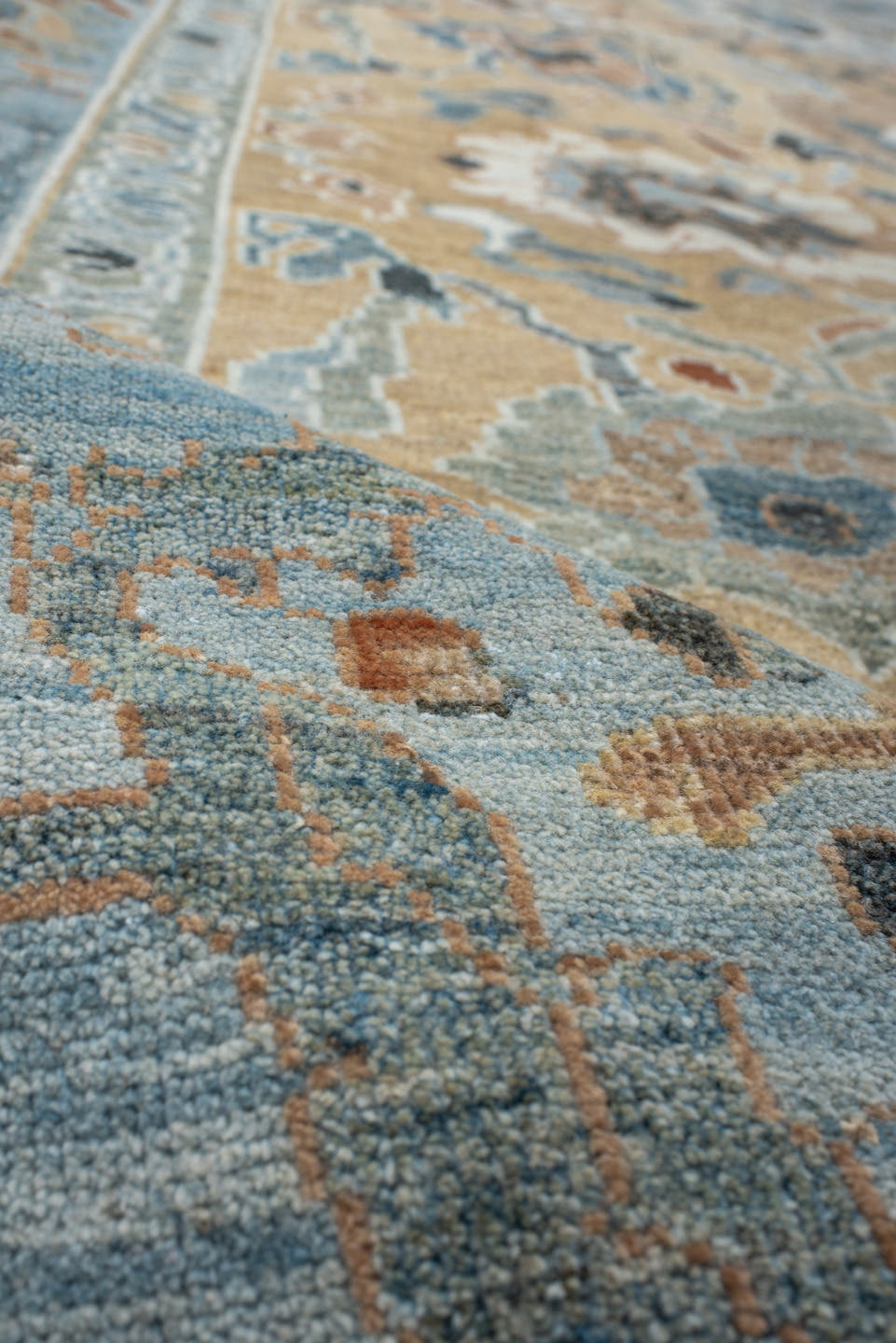 7' x 9' one-of-a-kind handmade vintage Sultanabad large size rug. Color palette: sky blue, tan, ivory, slate, camel, rust