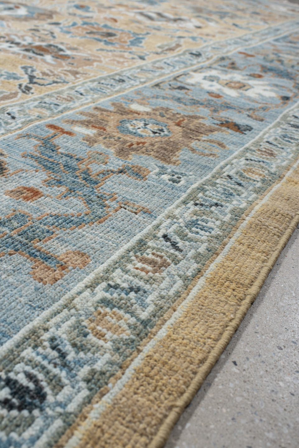 7' x 8' one-of-a-kind handmade vintage Sultanabad rug. Color palette: light blue, beige, ivory, taupe, slate, rust, brown