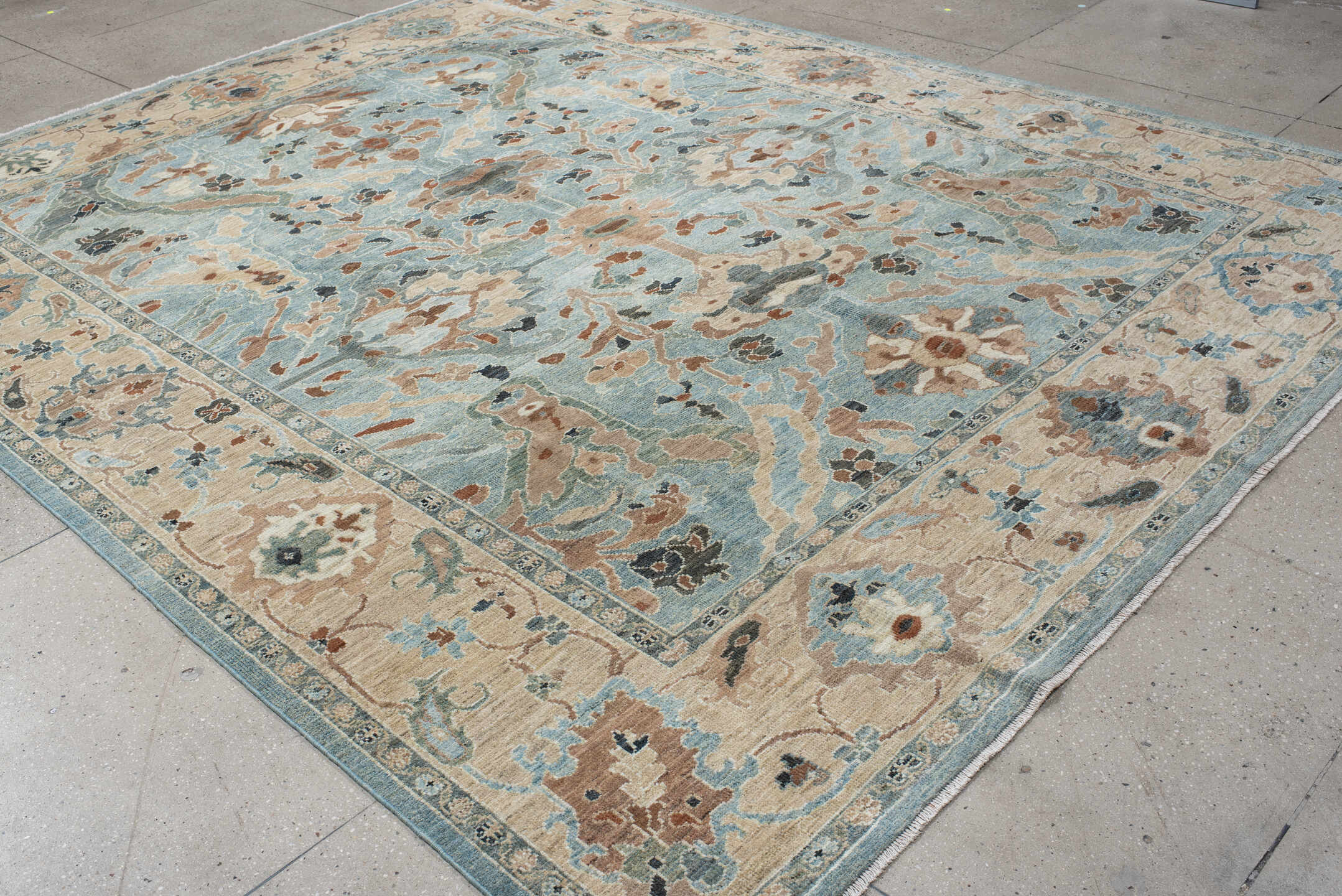 9' x 12' one-of-a-kind handmade vintage Sultanabad large size rug. Color palette: sky blue, ivory, taupe, terra cotta, slate