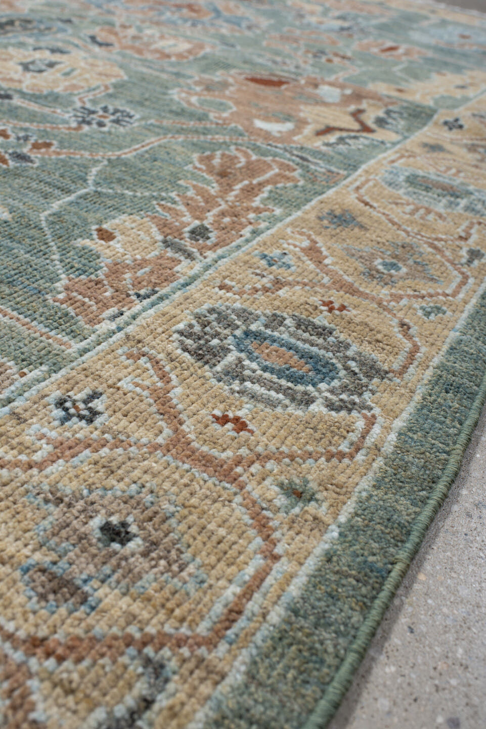 5' x 7' one-of-a-kind handmade vintage Sultanabad rug. Color palette: sage, ivory, peach, slate, rust, cream, charcoal