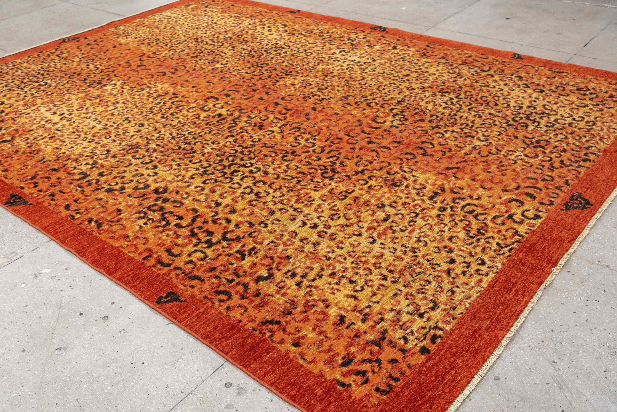 8' x 11' one-of-a-kind handmade vintage Tiger large size rug. Color palette: terra cotta, camel, charcoal, rust, gold