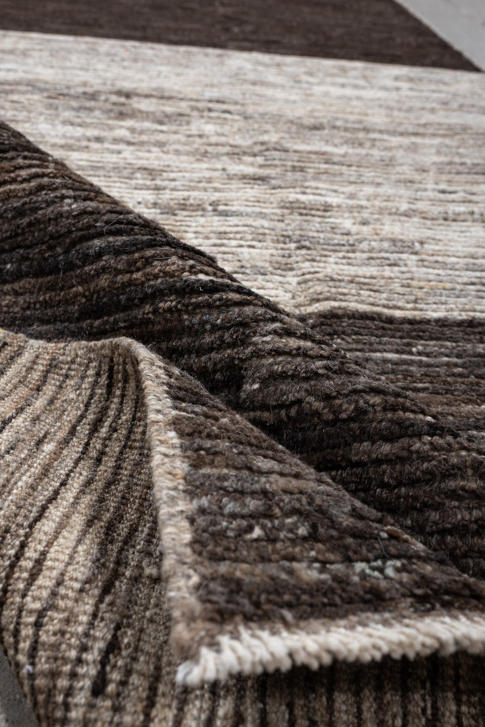 3' x 12' one-of-a-kind handmade vintage Tulu runner rug. Color palette: charcoal, taupe, ivory, brown, cream, slate, black