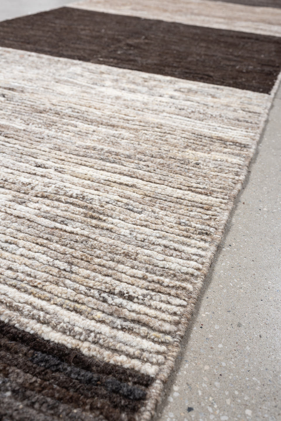 3' x 12' one-of-a-kind handmade vintage Tulu runner rug. Color palette: charcoal, taupe, ivory, brown, cream, slate, black