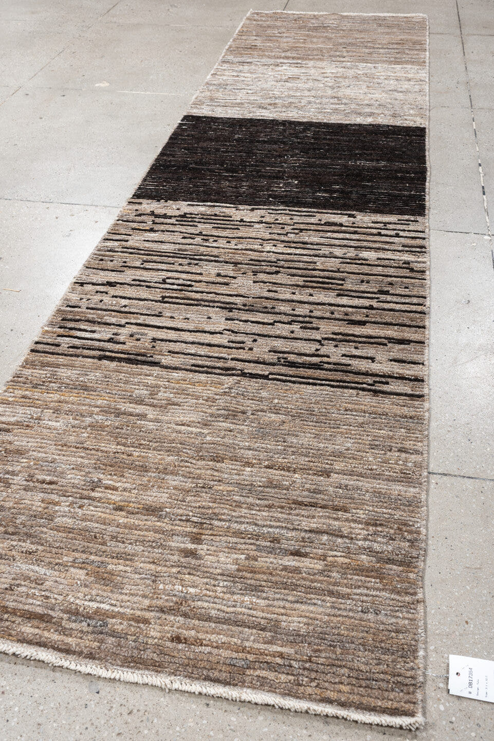 3' x 12' one-of-a-kind handmade vintage Tulu runner rug. Color palette: taupe, ivory, charcoal, cream, brown, greige, beige