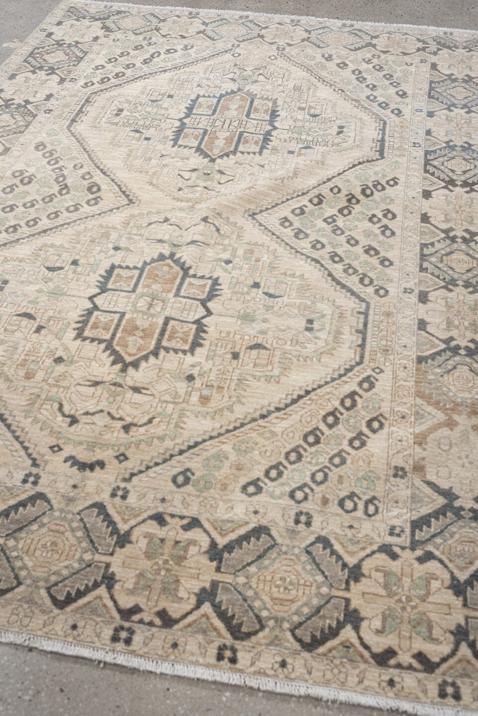 5' x 7' one-of-a-kind handmade vintage Afshar rug. Color palette: ivory, charcoal, sage, sand, taupe, camel, black, gray