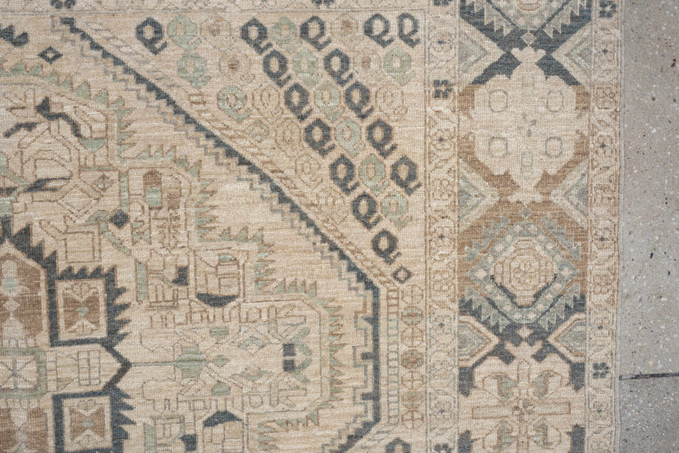 5' x 7' one-of-a-kind handmade vintage Afshar rug. Color palette: ivory, charcoal, sage, sand, taupe, camel, black, gray