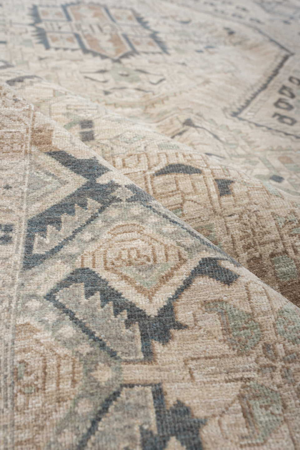 5' x 7' one-of-a-kind handmade vintage Afshar rug. Color palette: ivory, charcoal, sage, sand, taupe, camel, black, gray