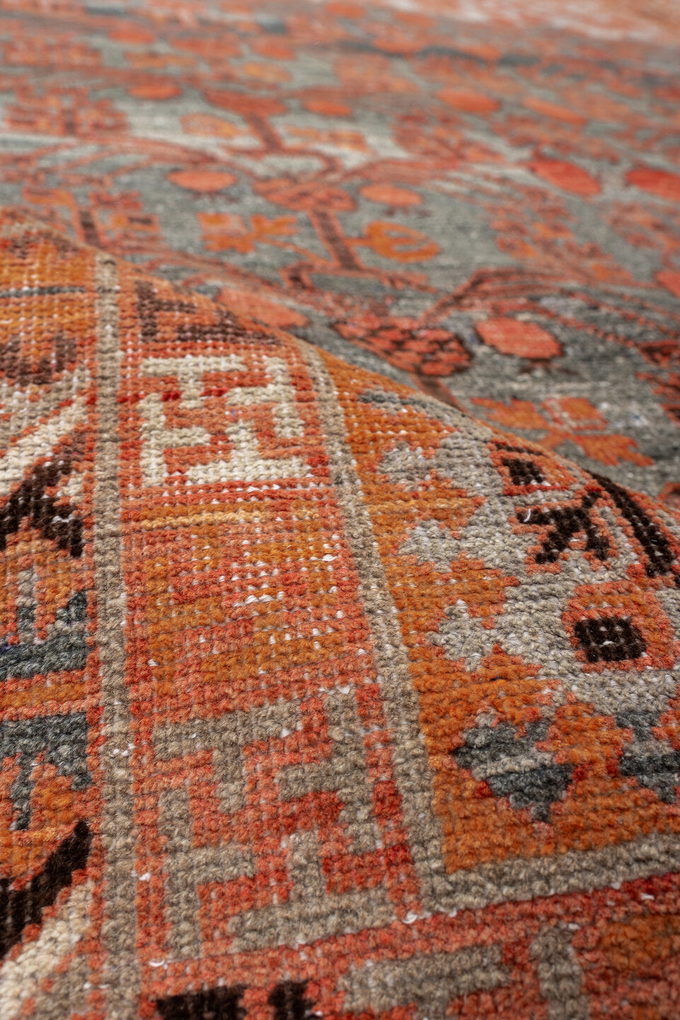 6' x 13' one-of-a-kind handmade antique Khotan large size rug. Color palette: slate, terra cotta, rust, ivory, charcoal