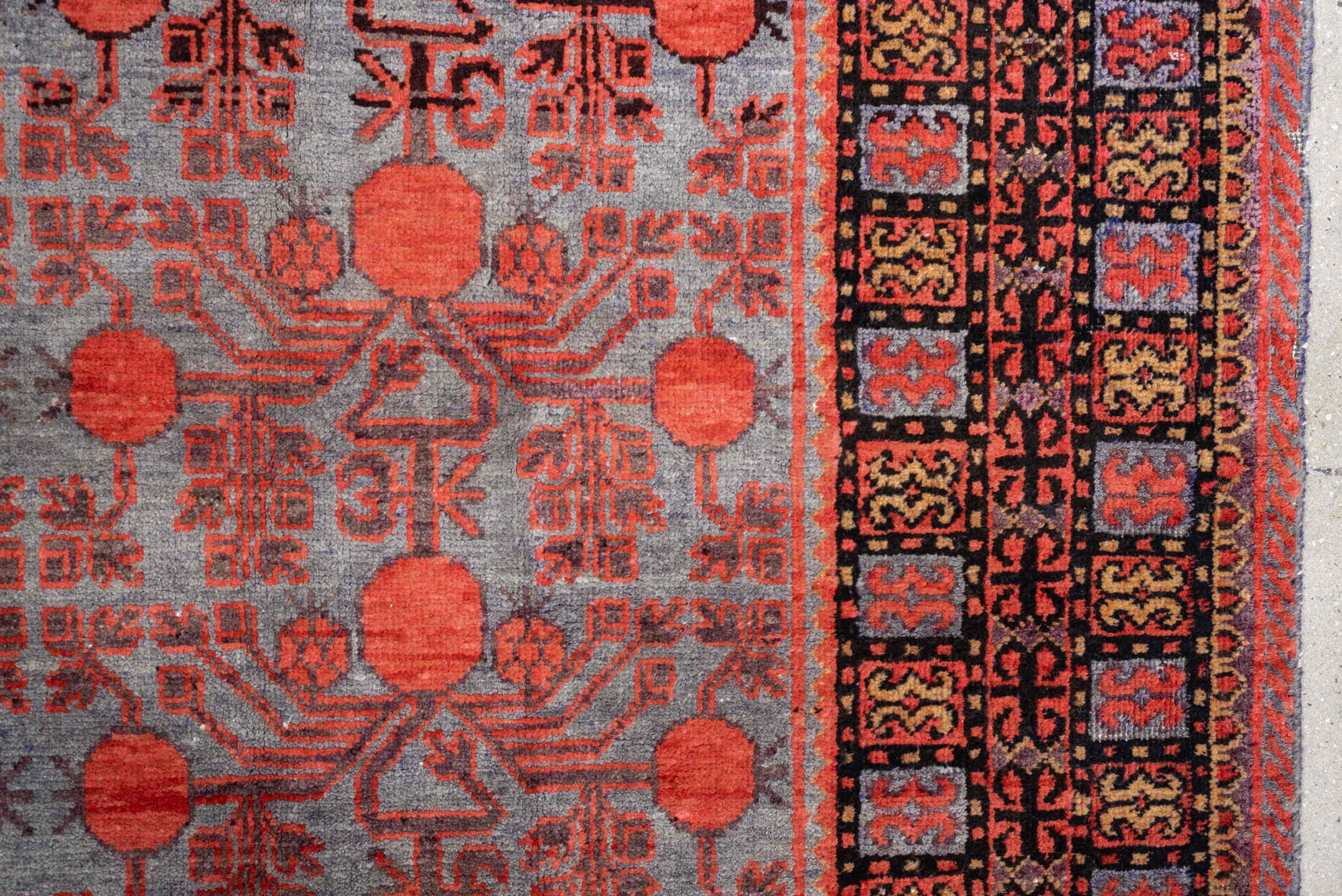 7' x 13' one-of-a-kind handmade antique Khotan large size rug. Color palette: rose, terracotta, indigo, ivory, coral
