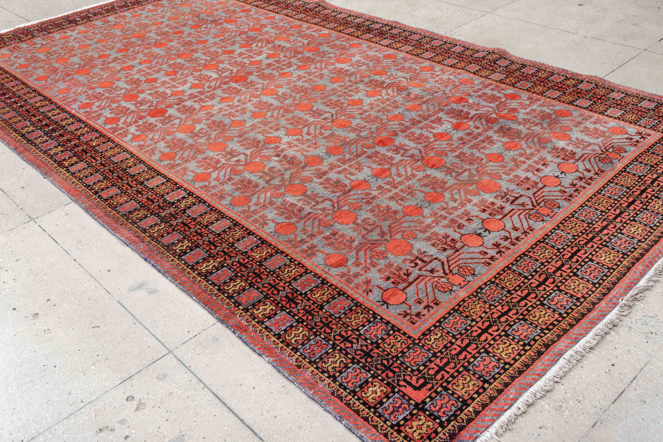 7' x 13' one-of-a-kind handmade antique Khotan large size rug. Color palette: rose, terracotta, indigo, ivory, coral