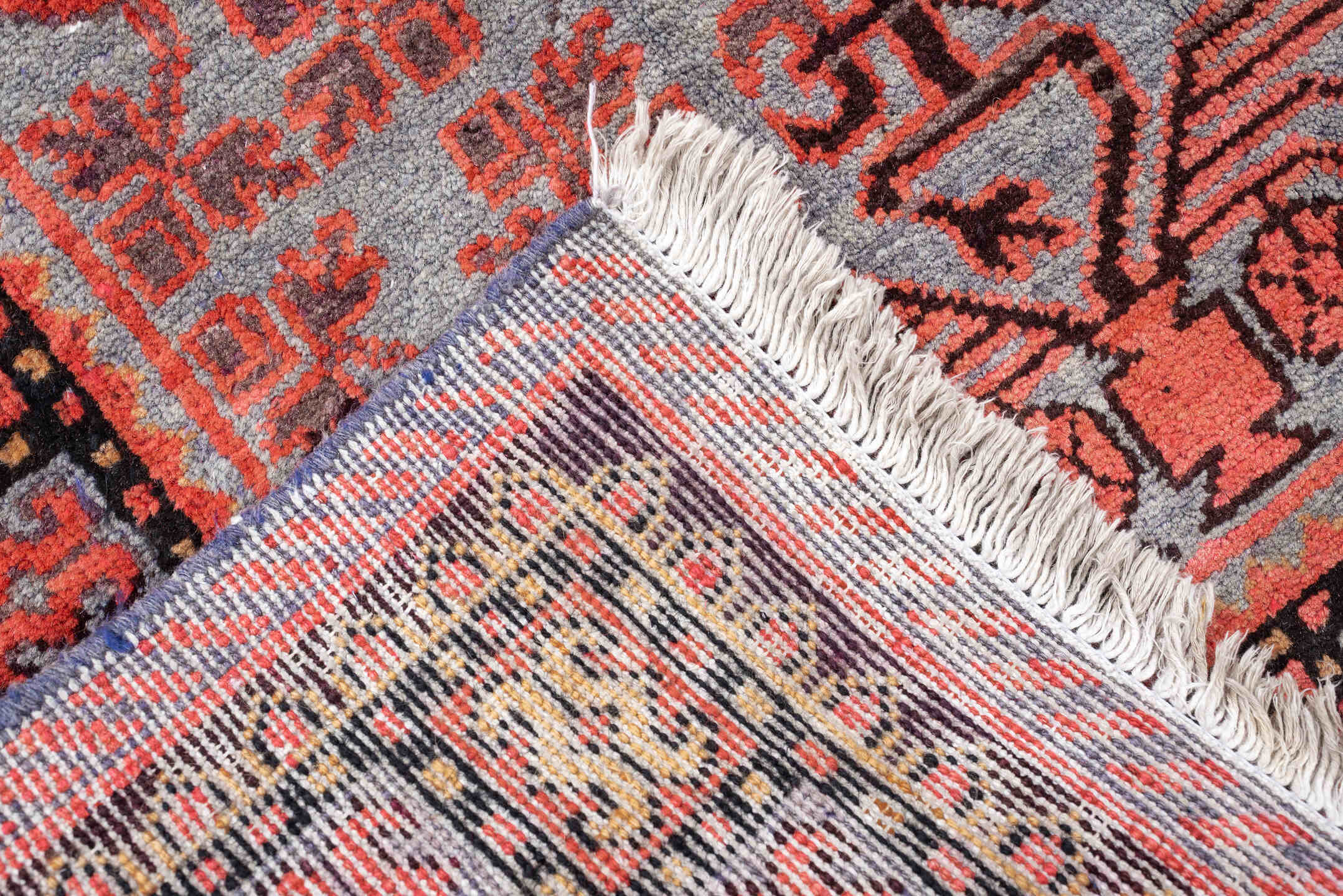 7' x 13' one-of-a-kind handmade antique Khotan large size rug. Color palette: rose, terracotta, indigo, ivory, coral