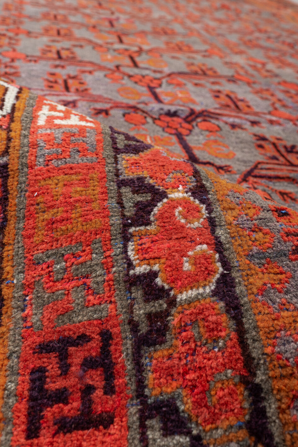 6' x 14' one-of-a-kind handmade antique Khotan large size rug. Color palette: slate, terracotta, rust, ivory, charcoal