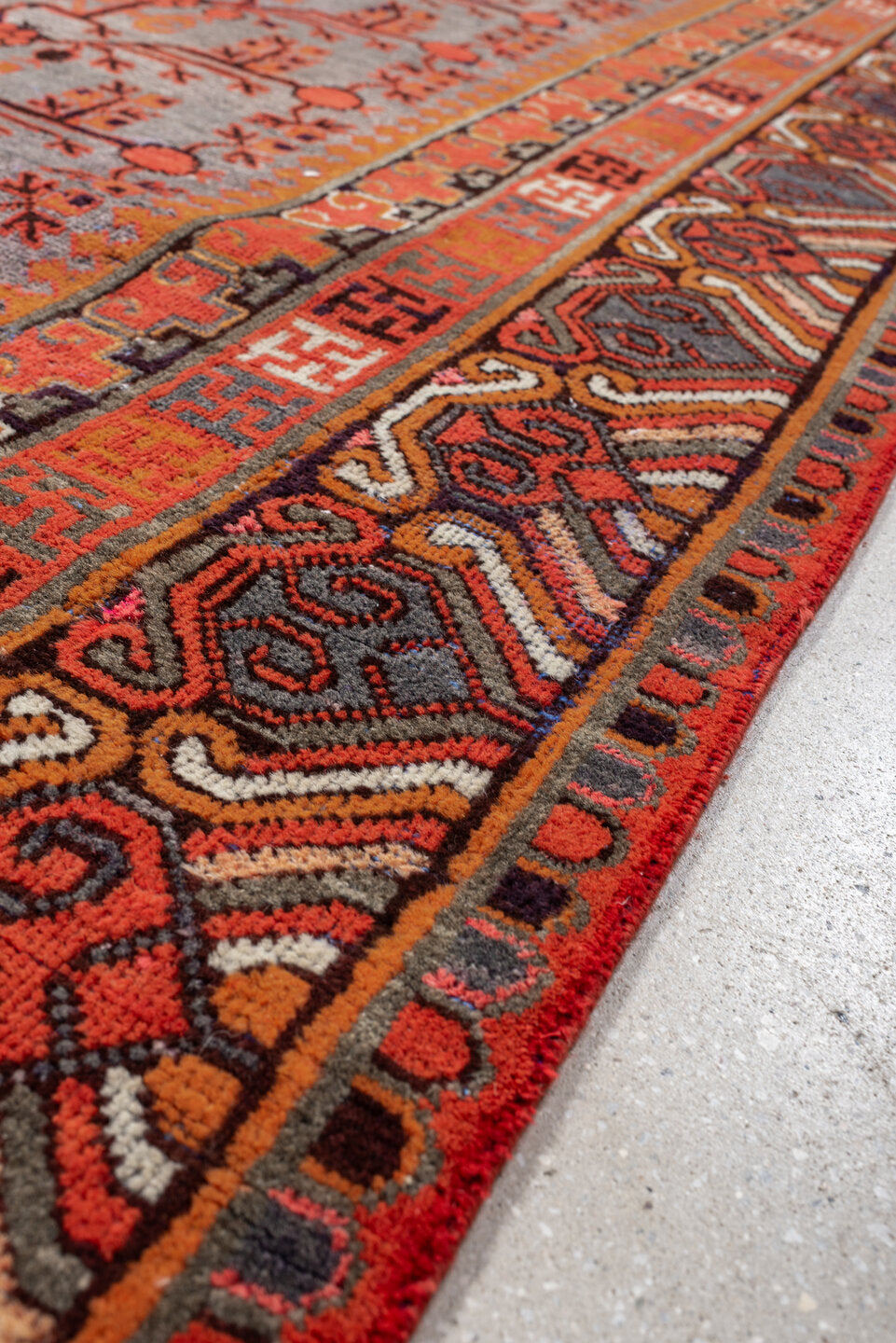 6' x 14' one-of-a-kind handmade antique Khotan large size rug. Color palette: slate, terracotta, rust, ivory, charcoal