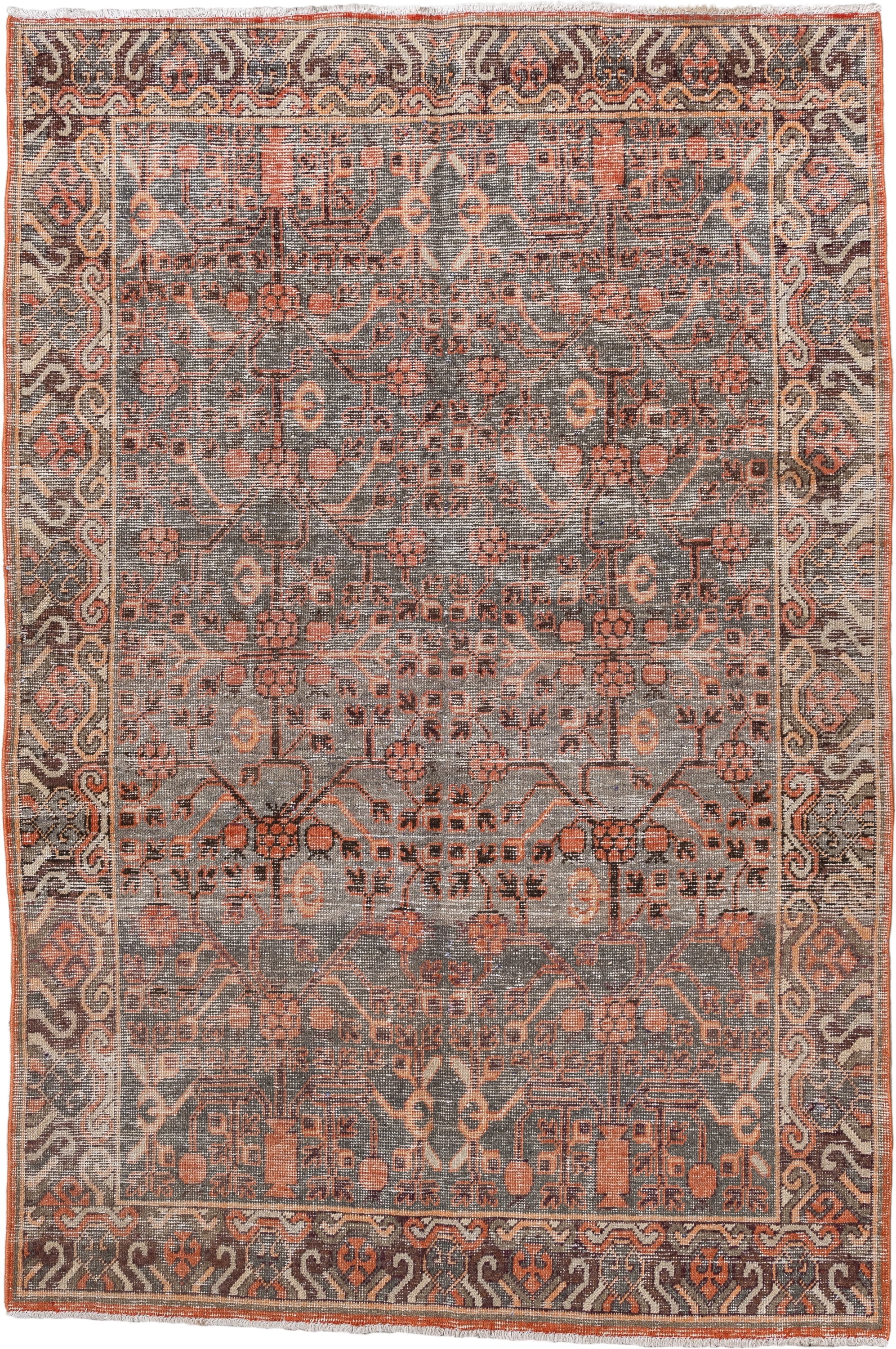 4' x 7' one-of-a-kind handmade antique  rug. Color palette: charcoal, coral, ivory, taupe, slate, terra cotta, brown, black