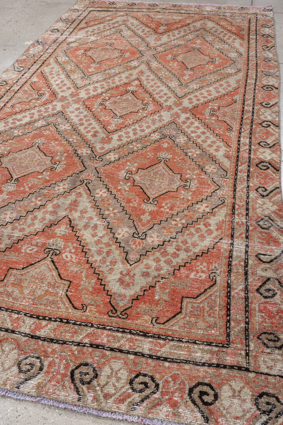 5' x 10' one-of-a-kind handmade antique Khotan large size rug. Color palette: coral, ivory, taupe, charcoal, sand