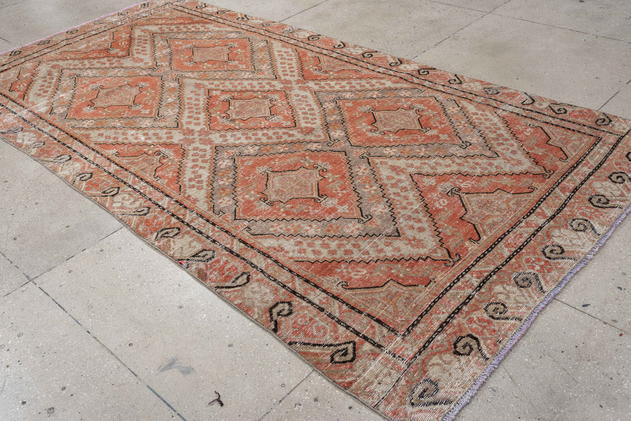 5' x 10' one-of-a-kind handmade antique Khotan large size rug. Color palette: coral, ivory, taupe, charcoal, sand