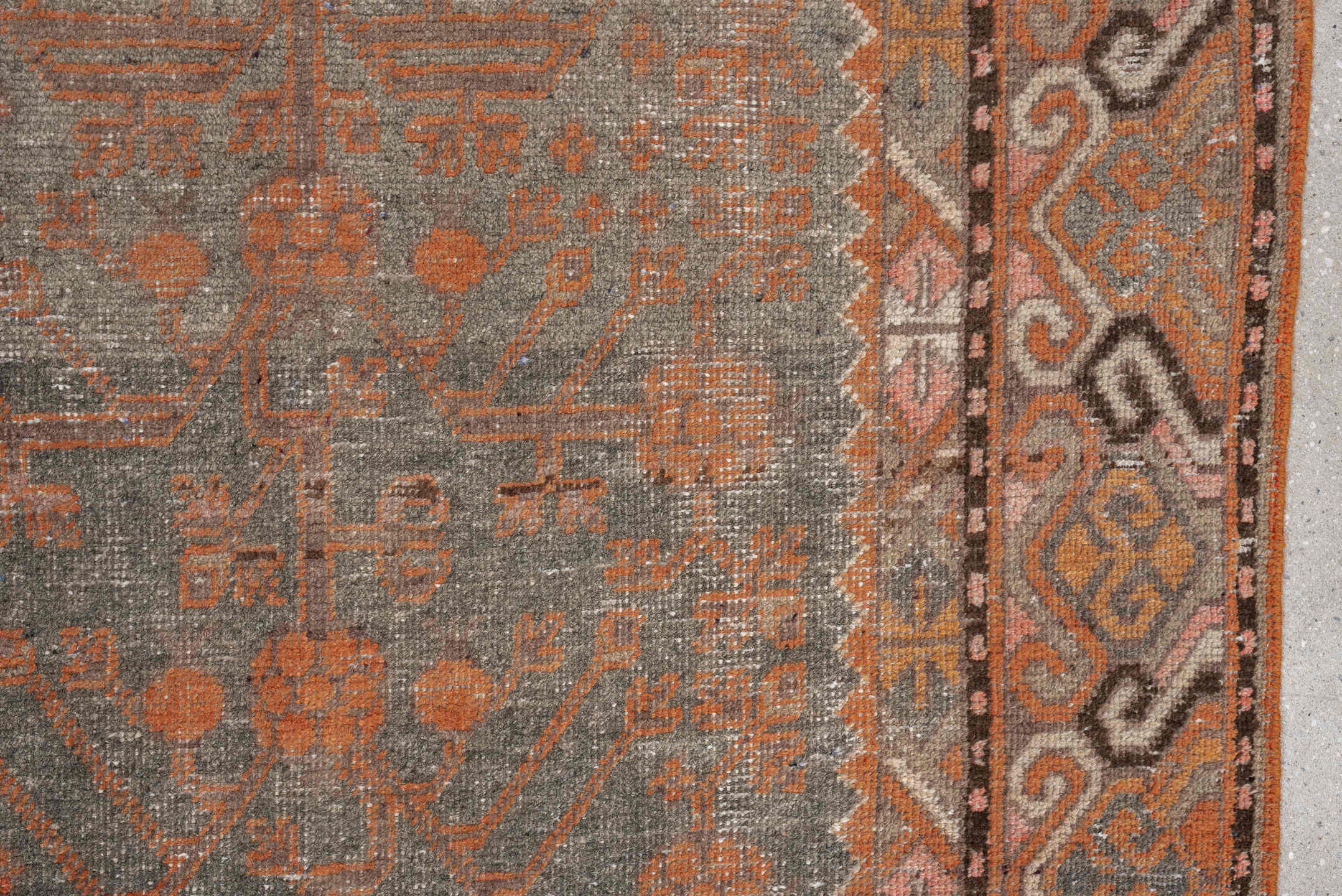 5' x 11' one-of-a-kind handmade antique Khotan large size rug. Color palette: taupe, terra cotta, charcoal, ivory, camel