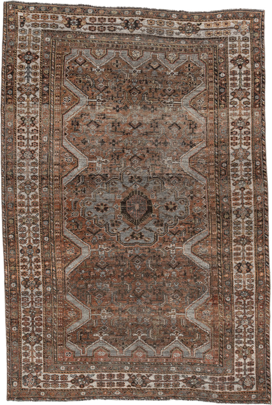 5' x 7' one-of-a-kind handmade antique Shiraz medium size rug. Color palette: rust, brown, ivory, taupe, charcoal, camel