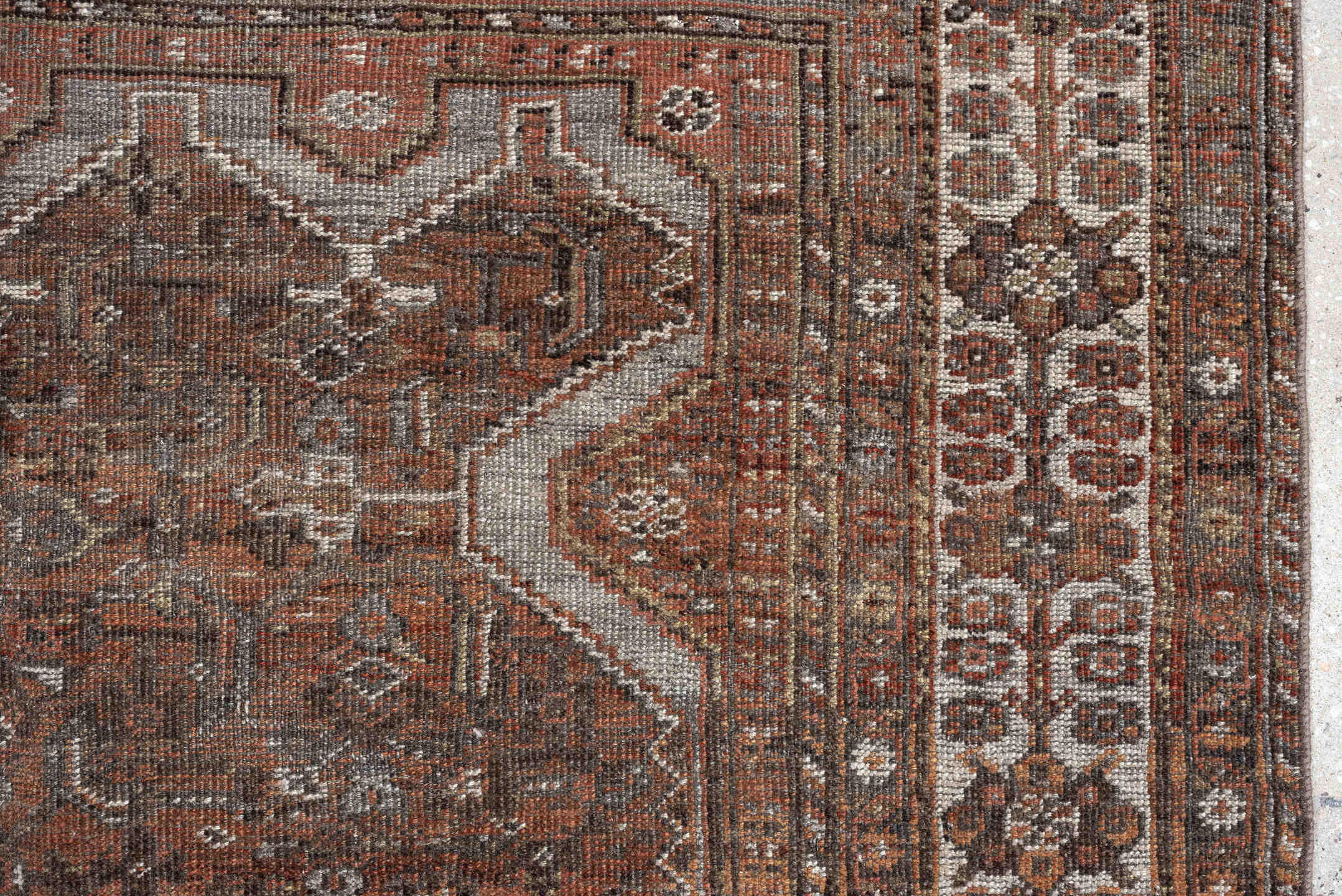 5' x 7' one-of-a-kind handmade antique Shiraz medium size rug. Color palette: rust, brown, ivory, taupe, charcoal, camel