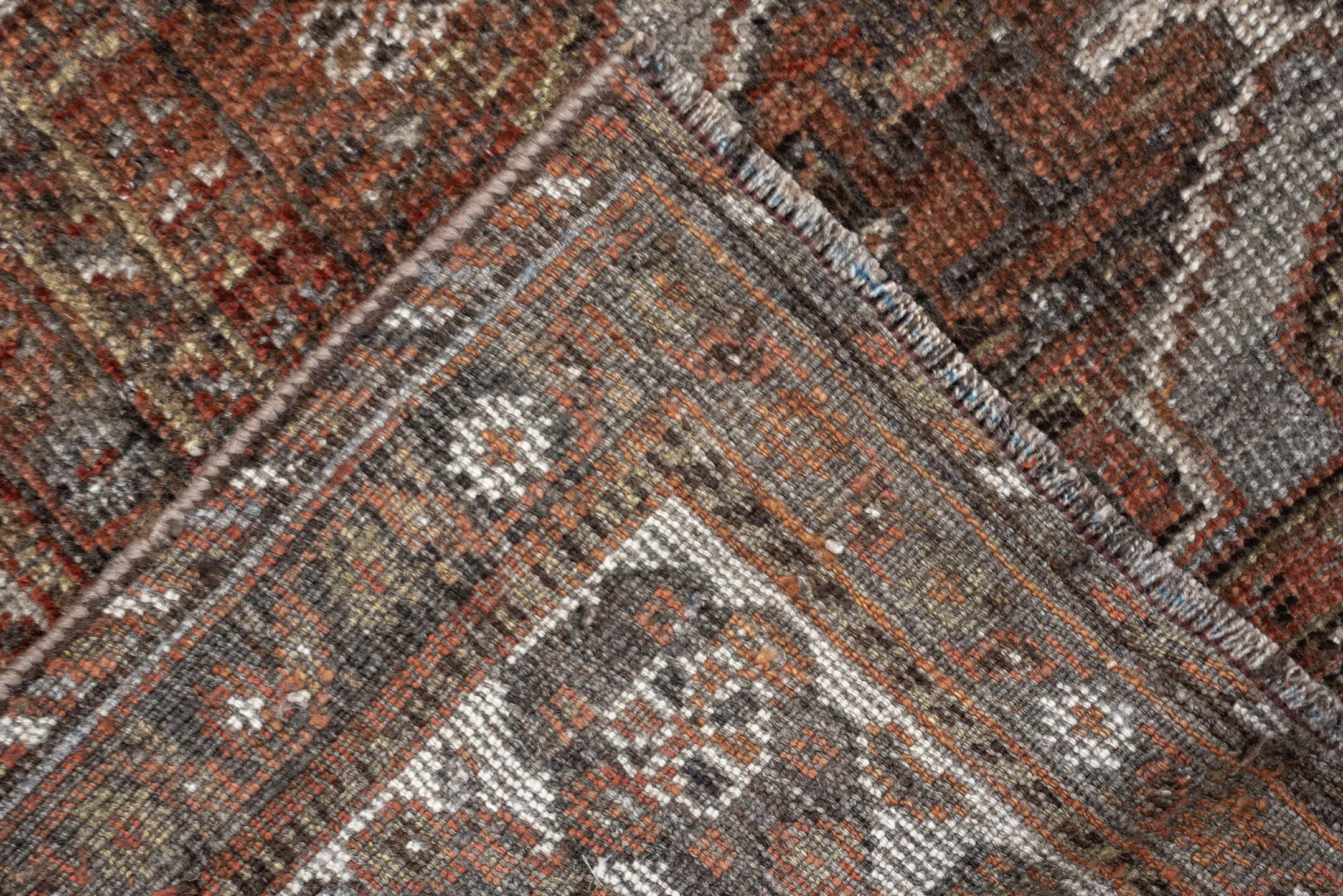 5' x 7' one-of-a-kind handmade antique Shiraz medium size rug. Color palette: rust, brown, ivory, taupe, charcoal, camel