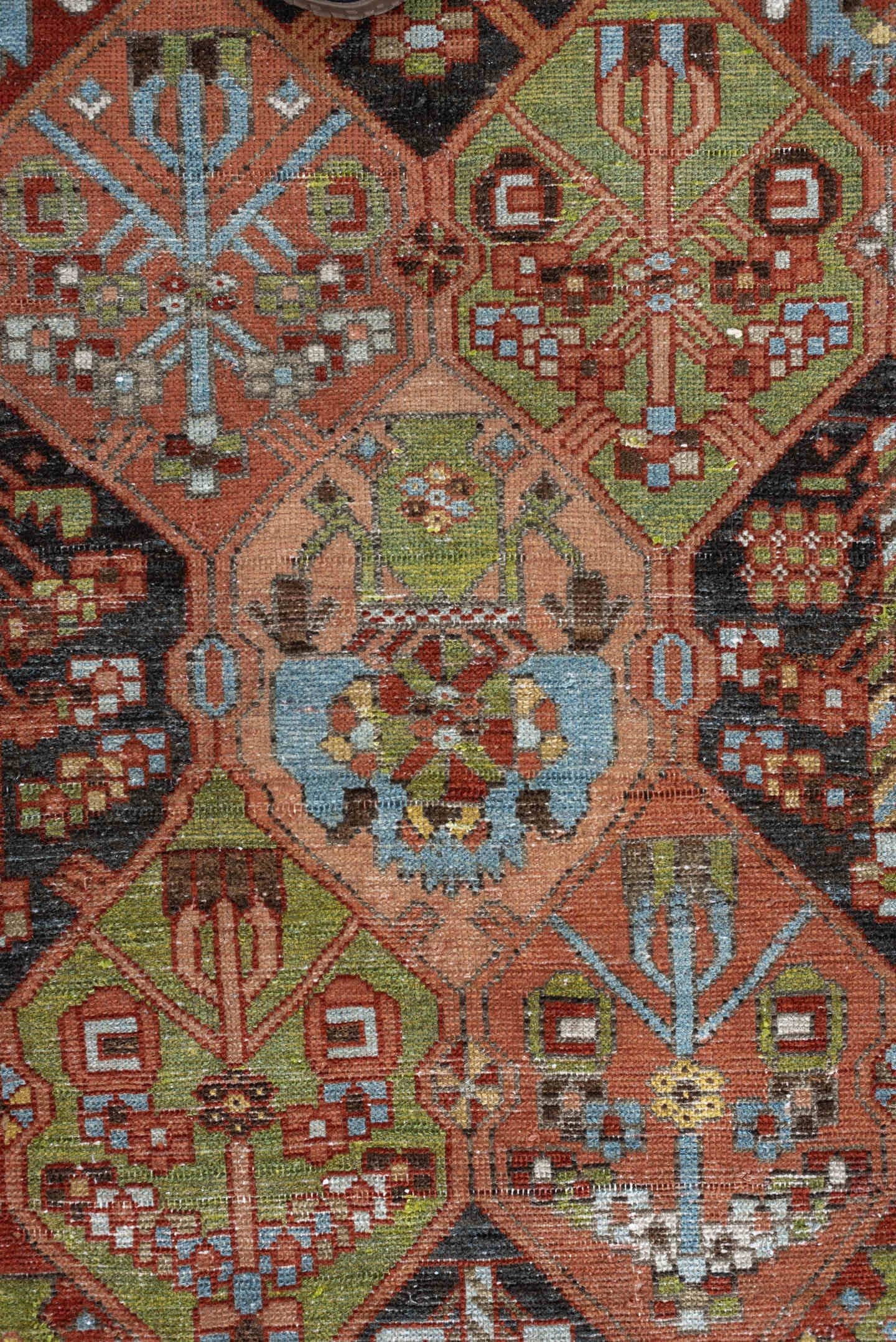 6' x 9' one-of-a-kind handmade antique Baktiary large size rug. Color palette: terra cotta, sky blue, olive, ivory, navy