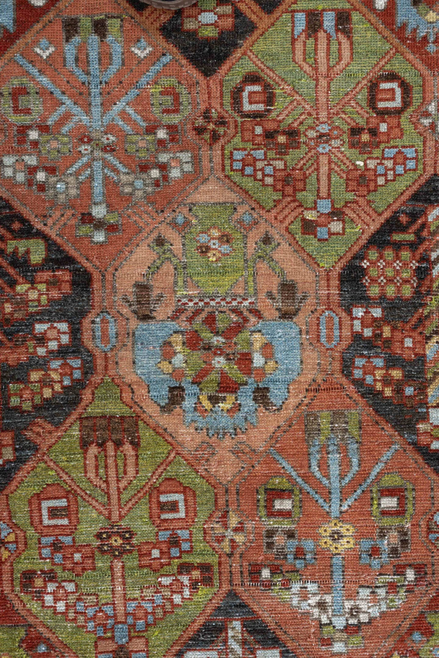 6' x 9' one-of-a-kind handmade antique Baktiary large size rug. Color palette: terra cotta, sky blue, olive, ivory, navy