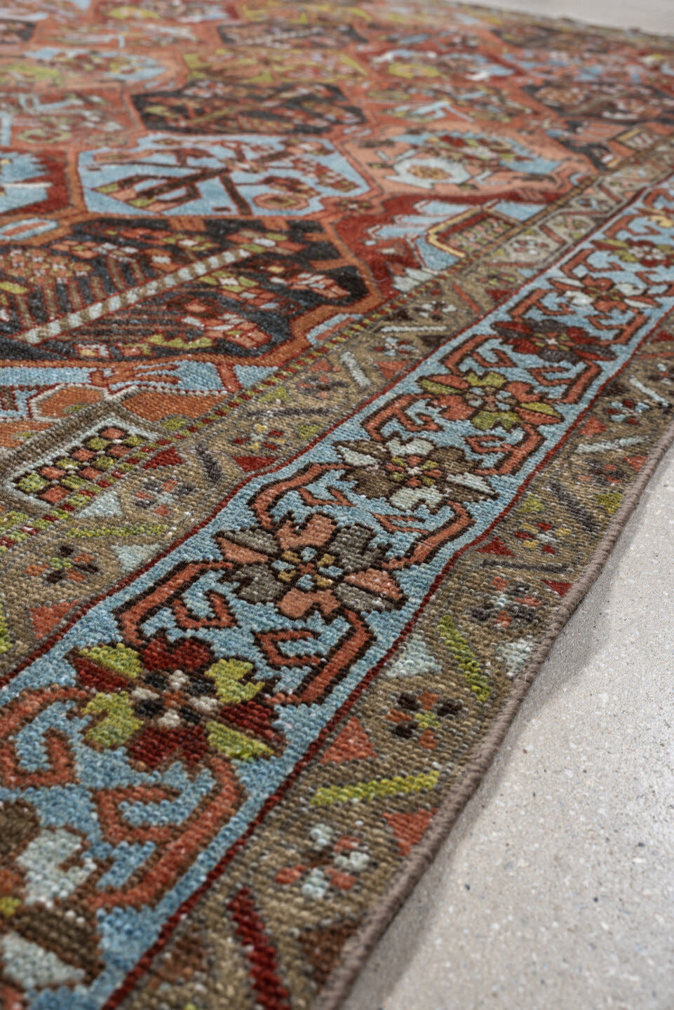 6' x 9' one-of-a-kind handmade antique Baktiary large size rug. Color palette: terra cotta, sky blue, olive, ivory, navy