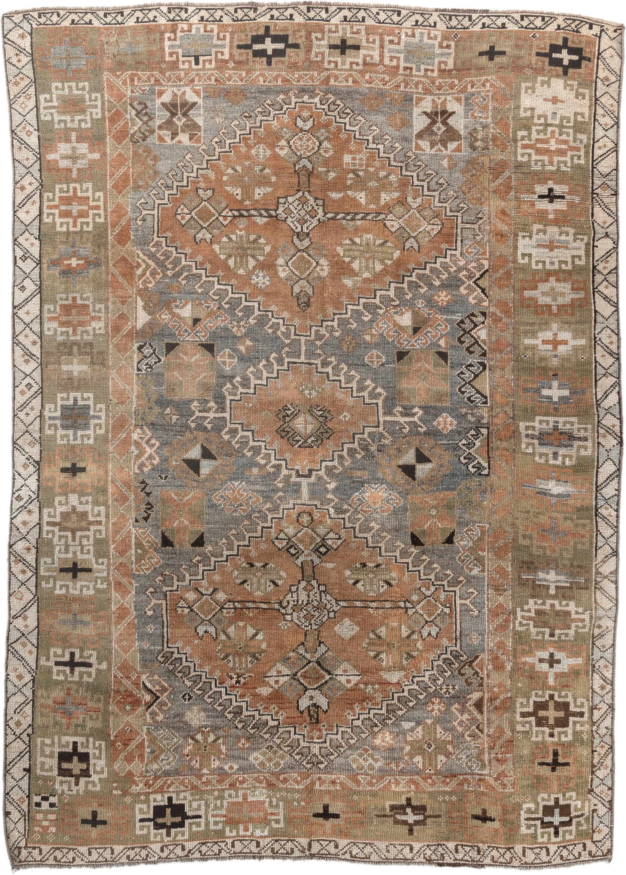4' x 6' one-of-a-kind handmade antique Shiraz rug. Color palette: terra cotta, sage, ivory, charcoal, taupe, slate, camel