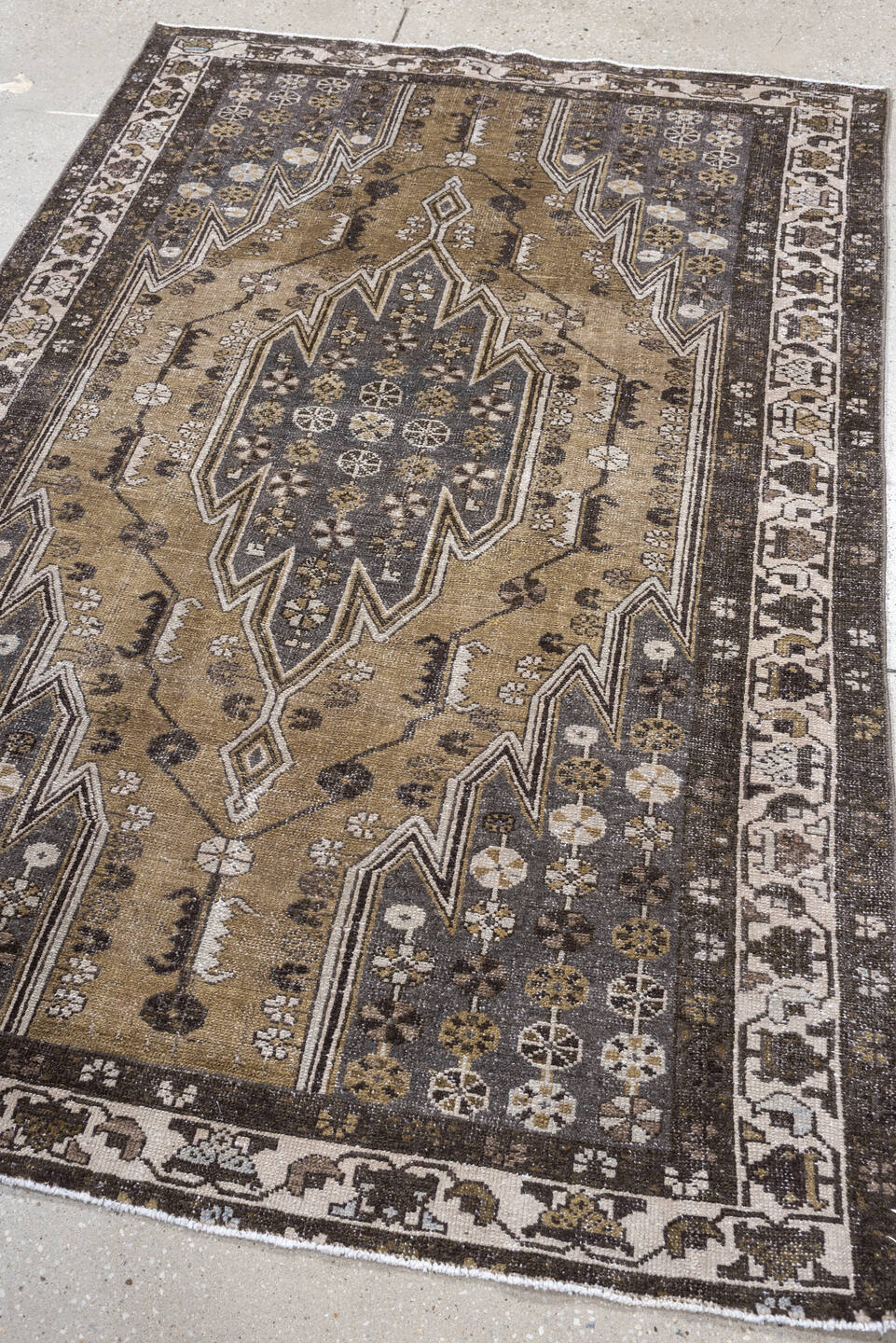 4' x 6' one-of-a-kind handmade antique Mazlaghan small size rug. Color palette: camel, charcoal, ivory, taupe, olive, brown