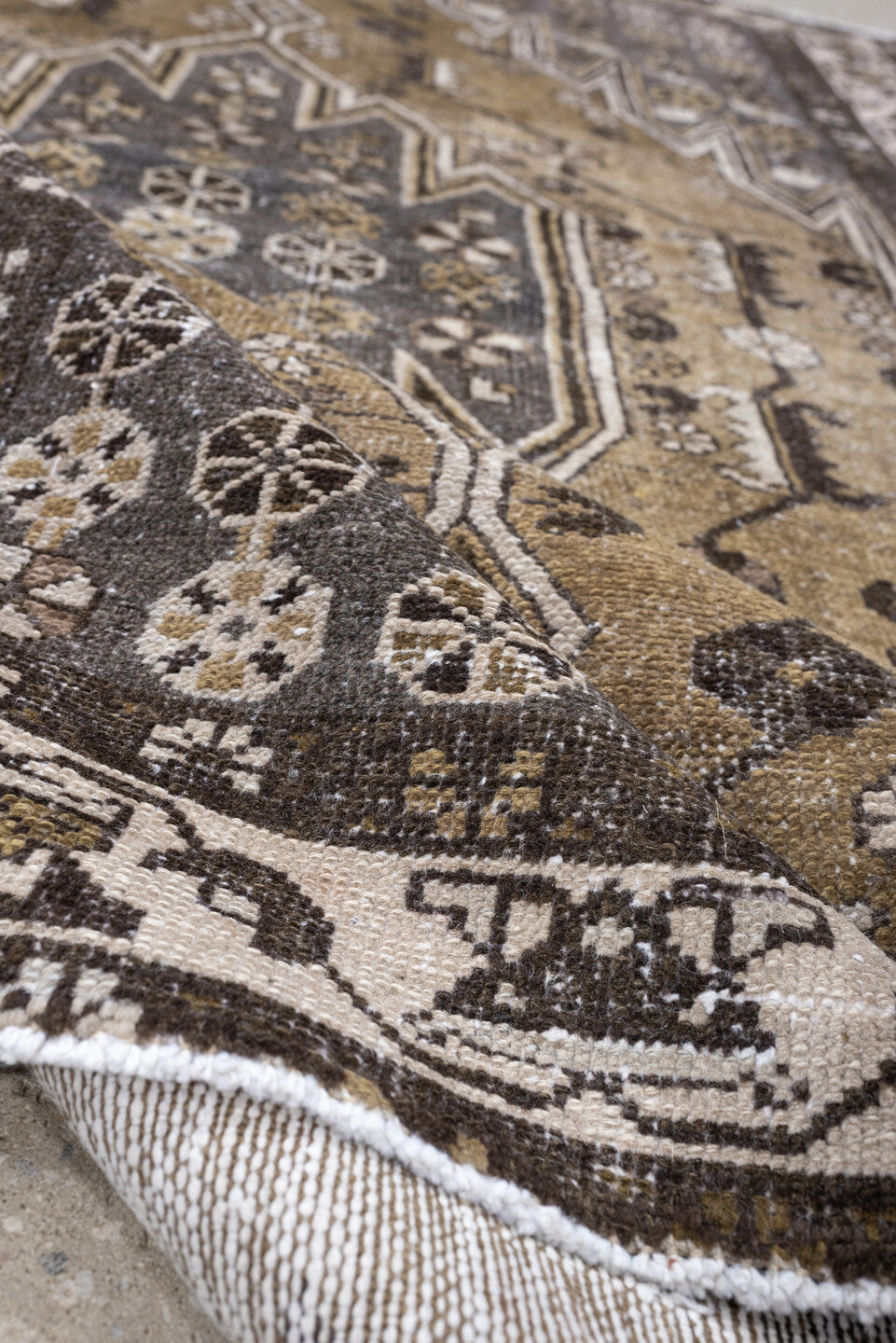 4' x 6' one-of-a-kind handmade antique Mazlaghan small size rug. Color palette: camel, charcoal, ivory, taupe, olive, brown
