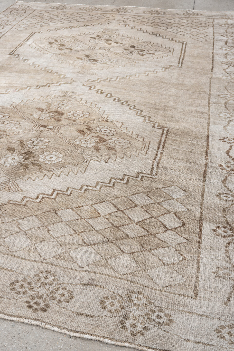 9' x 11' one-of-a-kind handmade antique Kars large size rug. Color palette: ivory, beige, taupe, camel, sand, gray
