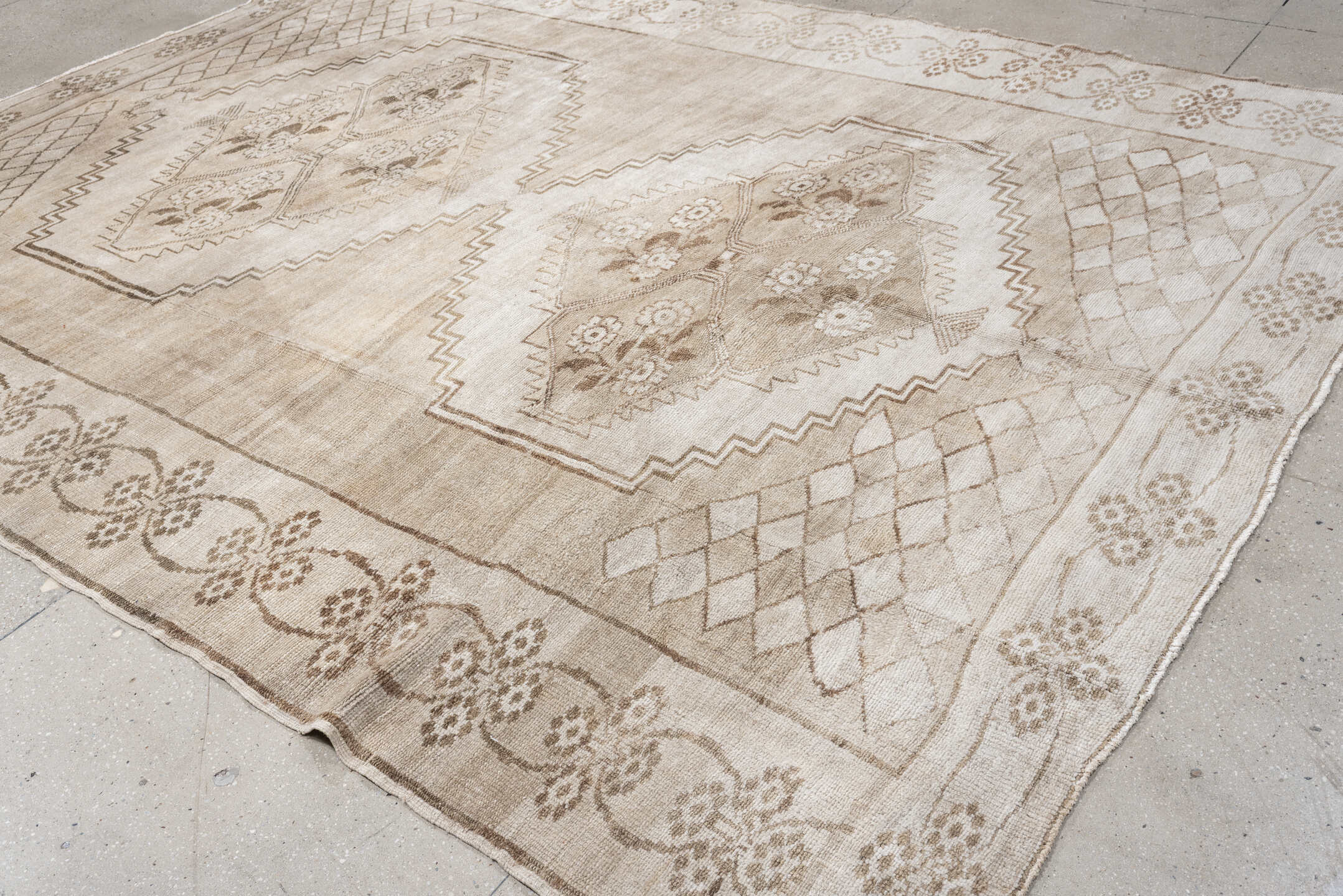 9' x 11' one-of-a-kind handmade antique Kars large size rug. Color palette: ivory, beige, taupe, camel, sand, gray