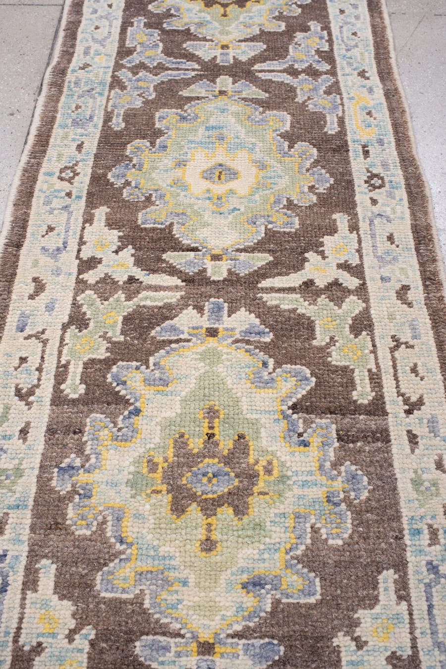 2' x 6' one-of-a-kind handmade vintage Oushak runner rug. Color palette: chocolate brown, pale blue, ivory, slate blue, sage