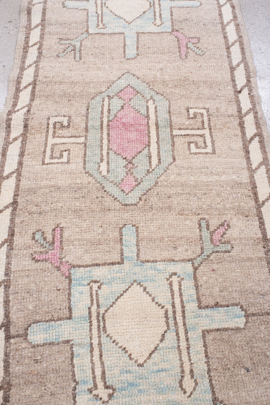 2' x 6' one-of-a-kind handmade vintage Oushak runner rug. Color palette: taupe, ivory, pale blue, rose, brown, charcoal
