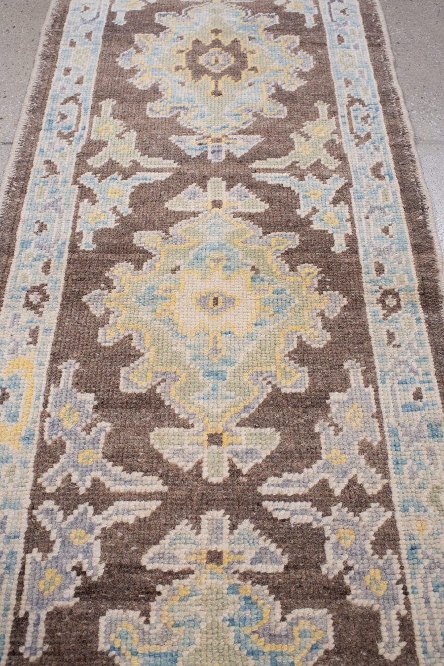 2' x 6' one-of-a-kind handmade vintage Oushak runner rug. Color palette: chocolate brown, pale blue, ivory, taupe