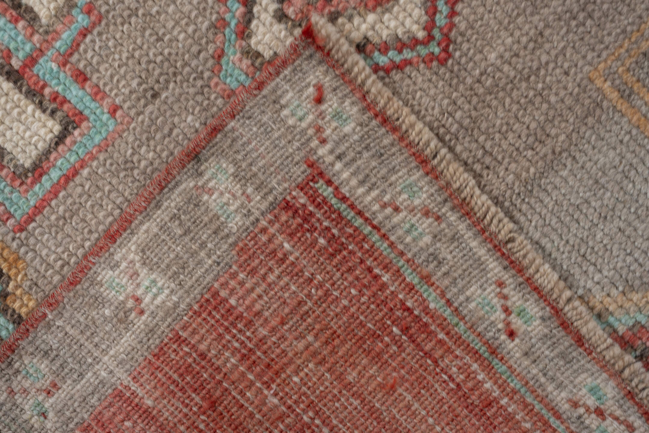 2' x 10' one-of-a-kind handmade vintage  runner rug. Color palette: terracotta, ivory, taupe, aqua, rust, sage, brown, beige