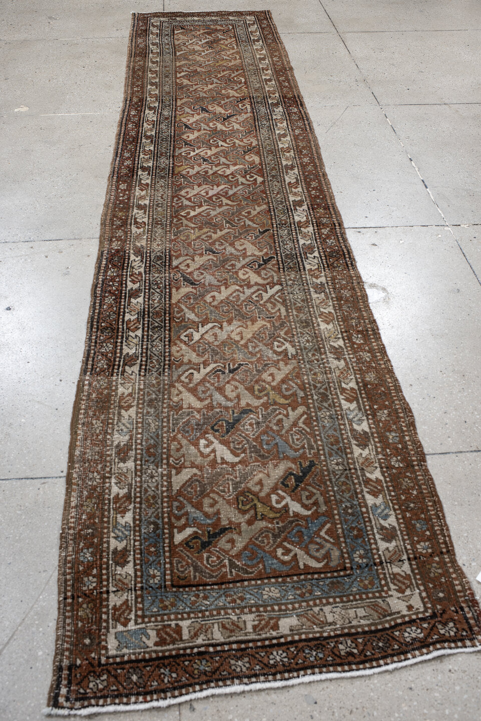 2' x 12' one-of-a-kind handmade vintage Heriz runner rug. Color palette: rust, ivory, slate, taupe, camel, charcoal, sienna