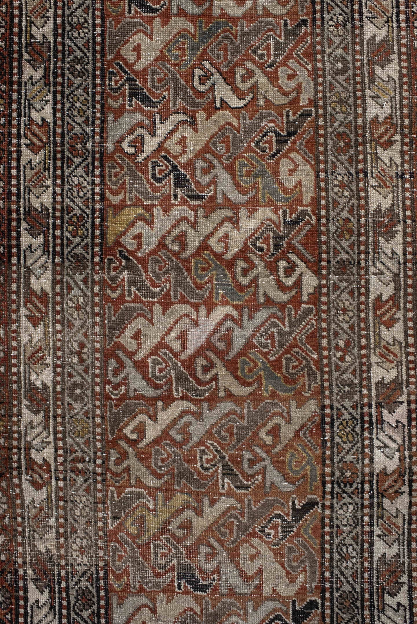 2' x 12' one-of-a-kind handmade vintage Heriz runner rug. Color palette: rust, ivory, slate, taupe, camel, charcoal, sienna